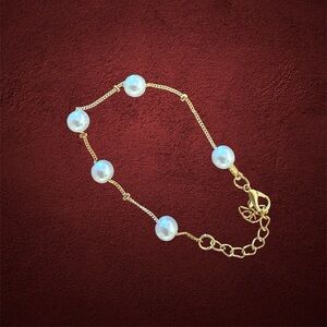 Elegant Gold and Faux Pearl Bracelet